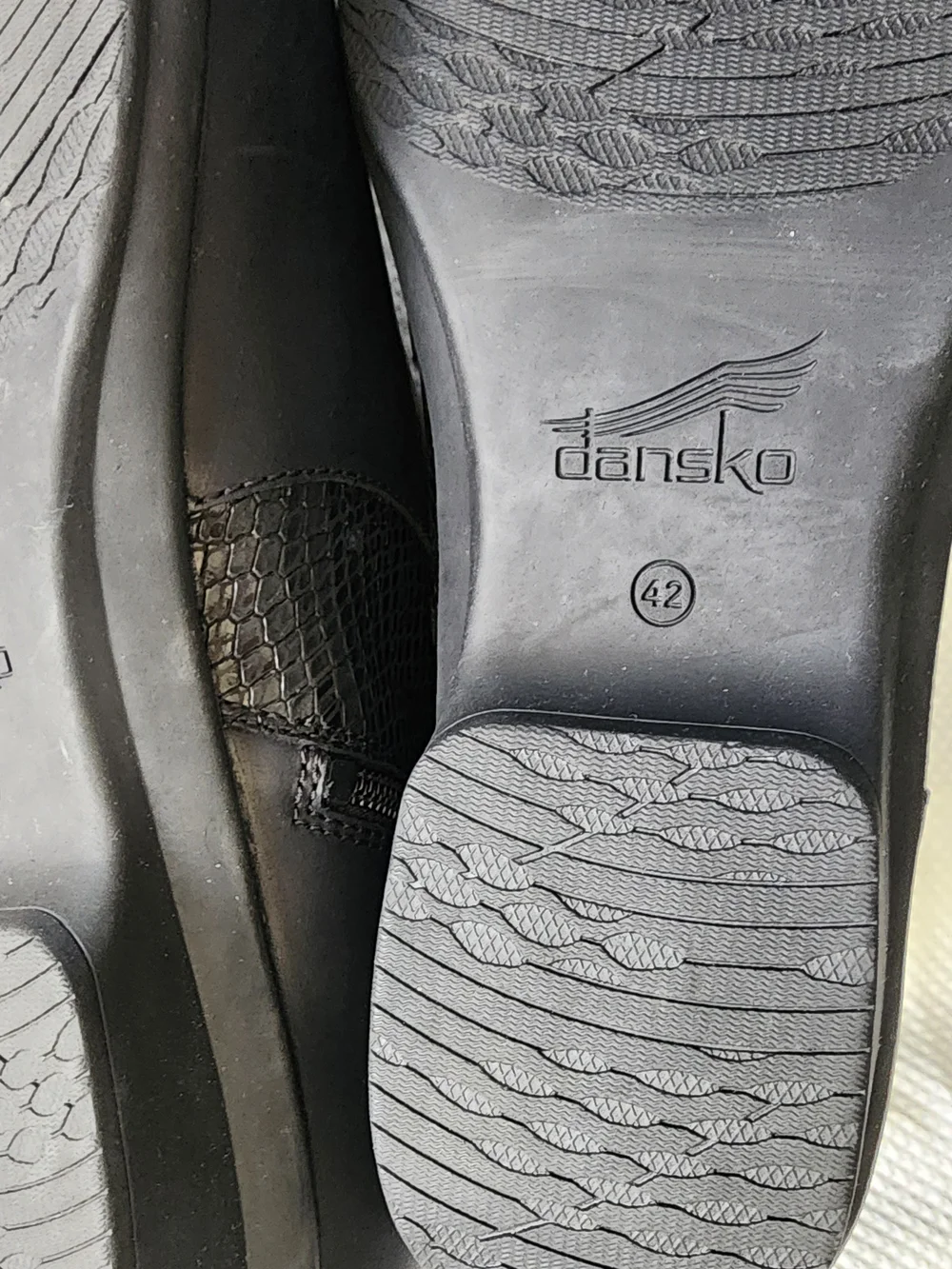 Dansko black leather ankle Boots with side buckle and textured panel